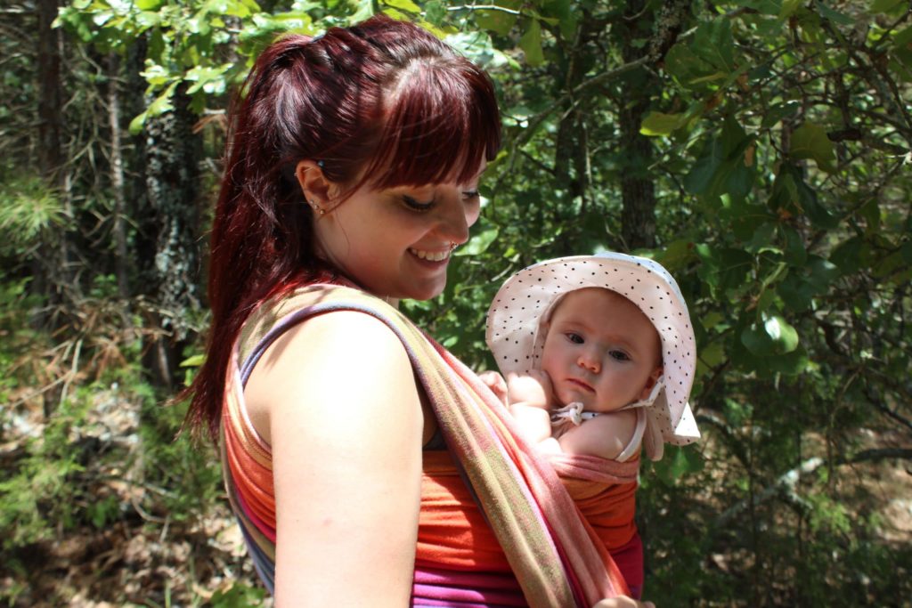 Oklahoma Birth Doula Jenni Jenkins hiking and babywearing daughter